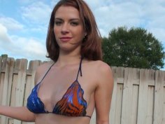 Horny brownhead Nicole Rider poses on a cam outdoors showing off her oiled body